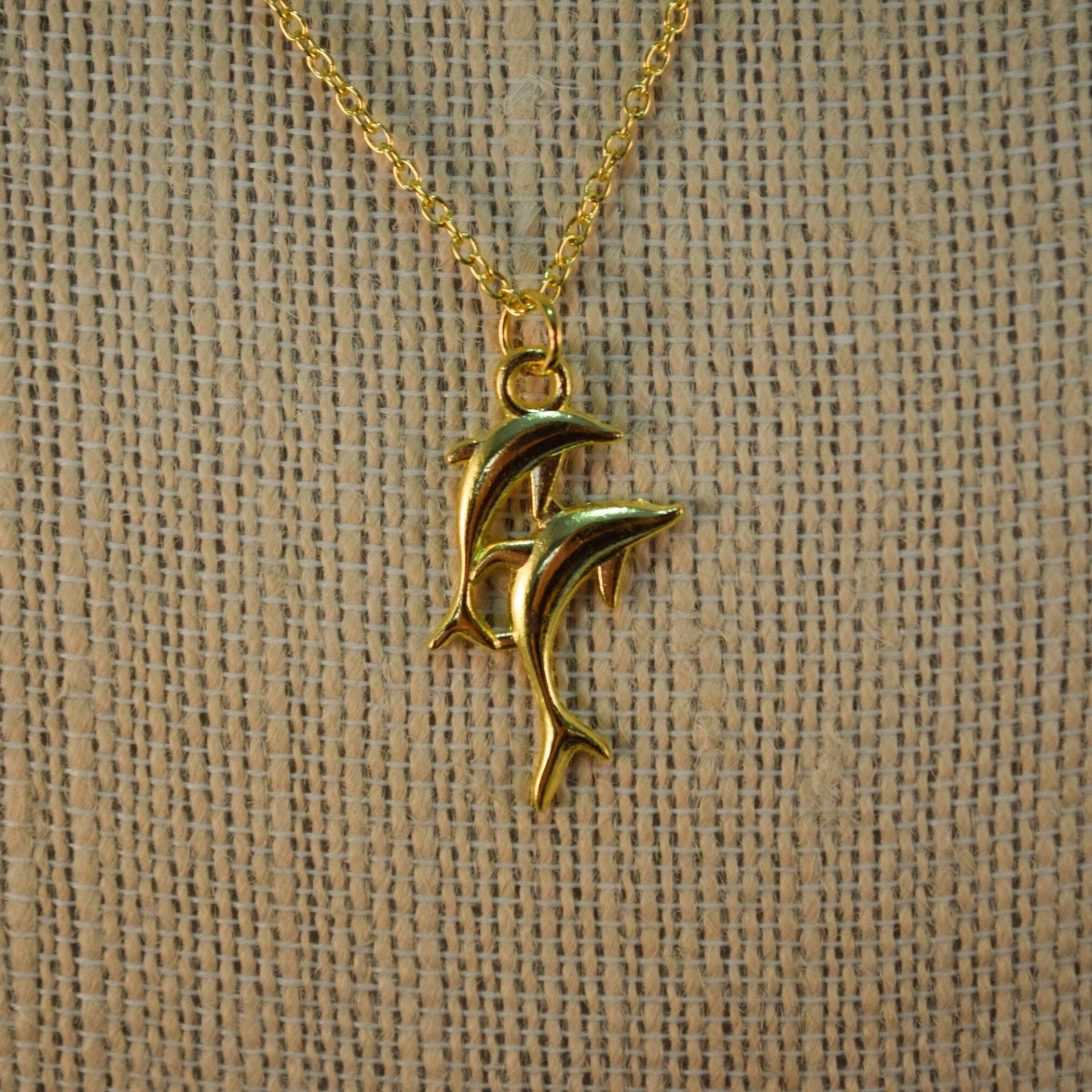 Springende Delfine Halskette in Gold Und Silber Springende Delfine Halskette in Gold Und Silber von WildWhimsicalWitty