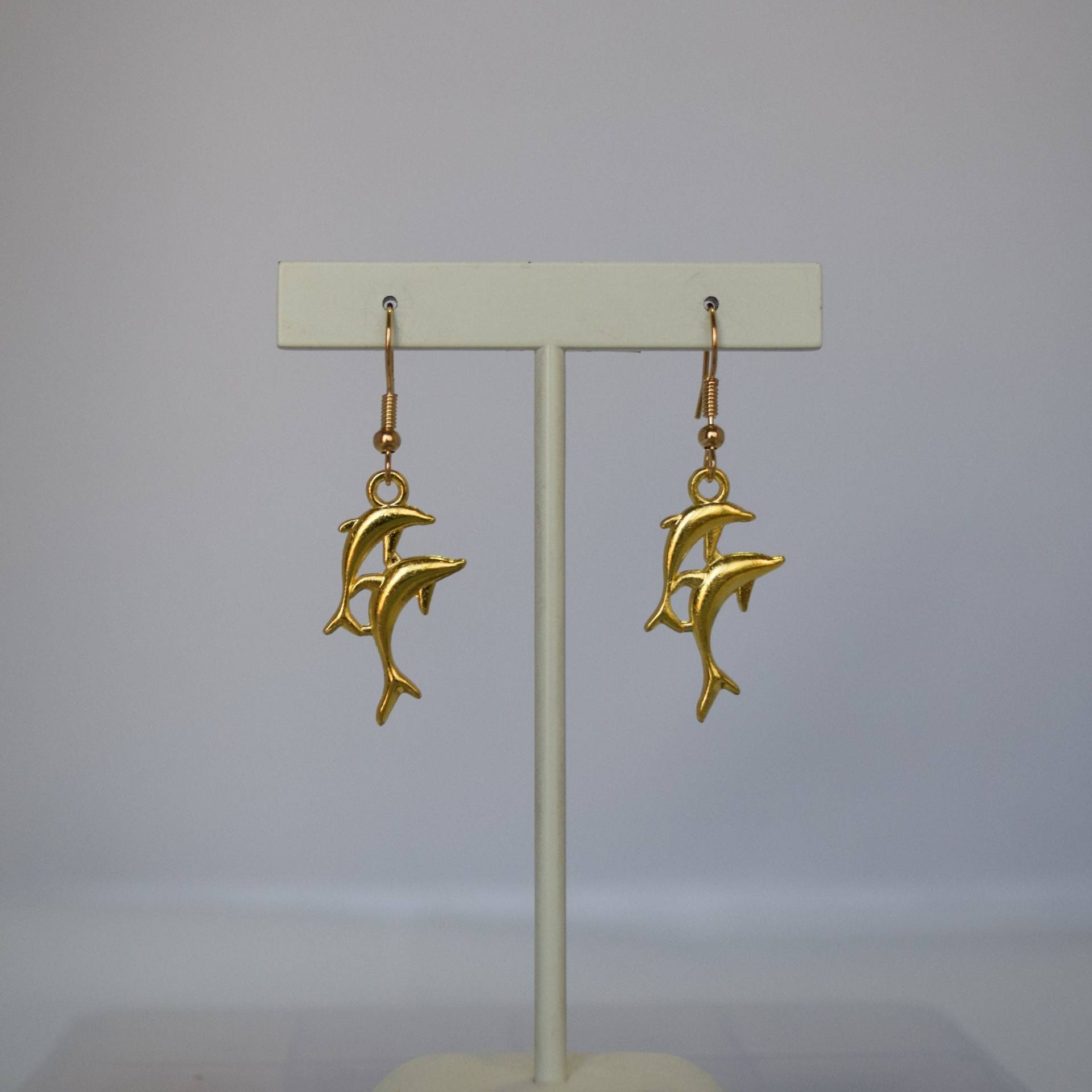 Springende Delfine Ohrringe in Gold Und Silber Springende Delfine Ohrringe in Gold Und Silber von WildWhimsicalWitty