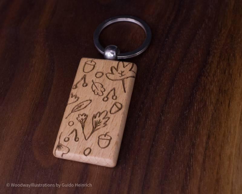 Holzschlüsselanhänger "Blätterregen" Holzschlüsselanhänger "Blätterregen" von WoodwayIllustrations