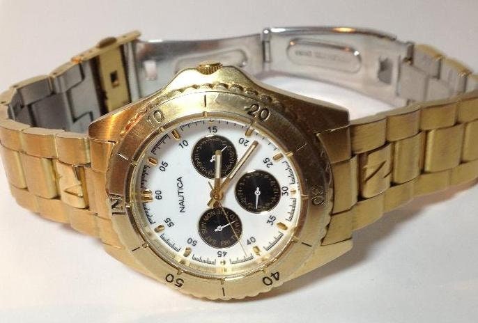 Nautica Gold Ton Uhr Chronograph Herren Multi Tag Datum Weiß Zifferblatt Pre Ownened Modell 095316 Mit Neuer Batterie Nautica Gold Ton Uhr Chronograph Herren Multi Tag Datum Weiß Zifferblatt Pre Ownened Modell 095316 Mit Neuer Batterie von WorldStamps2017