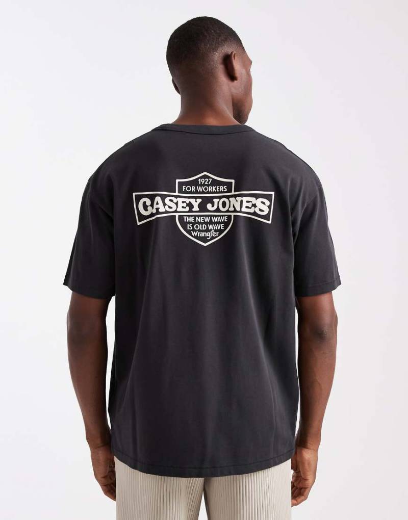 Wrangler - Casey Jones - Workwear-T-Shirt in Schwarz mit Grafikprint von Wrangler