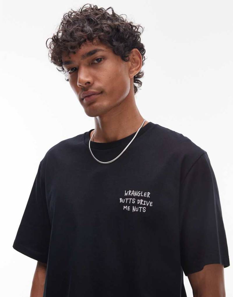 Wrangler - T-Shirt in Schwarz mit gestricktem Schriftzug auf der Brust von Wrangler