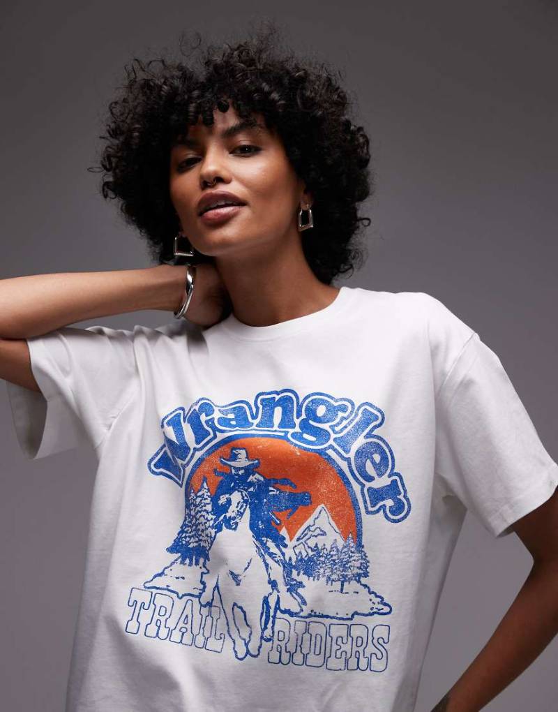Wrangler - T-Shirt in Wollweiß mit Cowboy-Grafik und Print auf der Brust von Wrangler