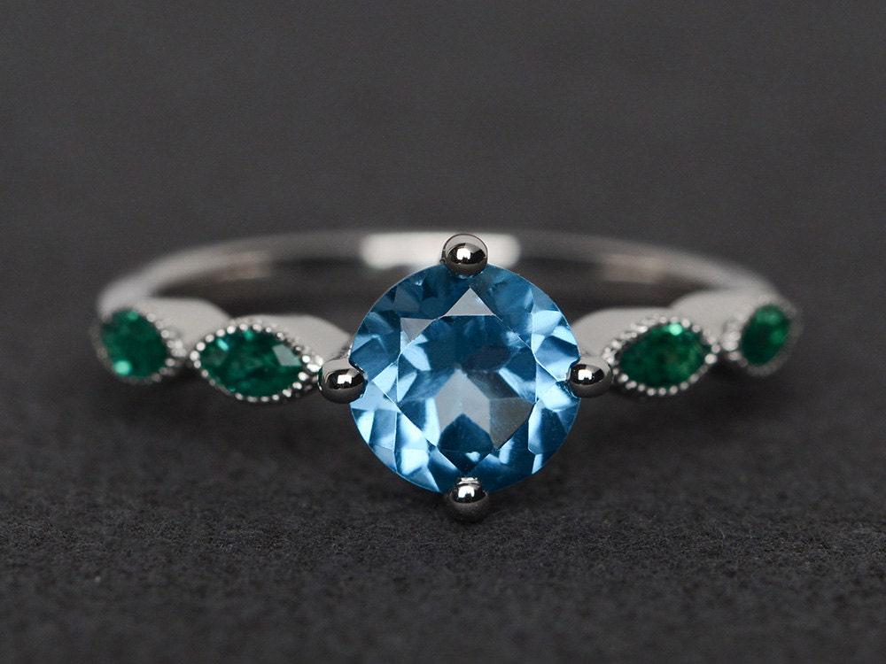 Schweizer Blautopas Ring Rundschliff Blauer Edelstein Verlobungsring Silberfassung von XiaoCuiJewelry