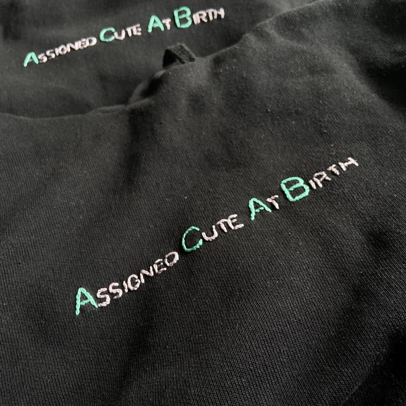Assigned Cute At Birth - Kapuzenpullover von XinanPandan