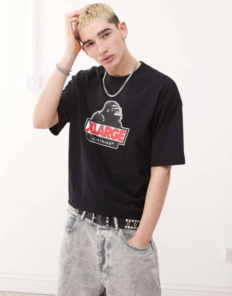 XLARGE - Oversize-T-Shirt in Schwarz mit schrägem OG-Logoprint von Xlarge
