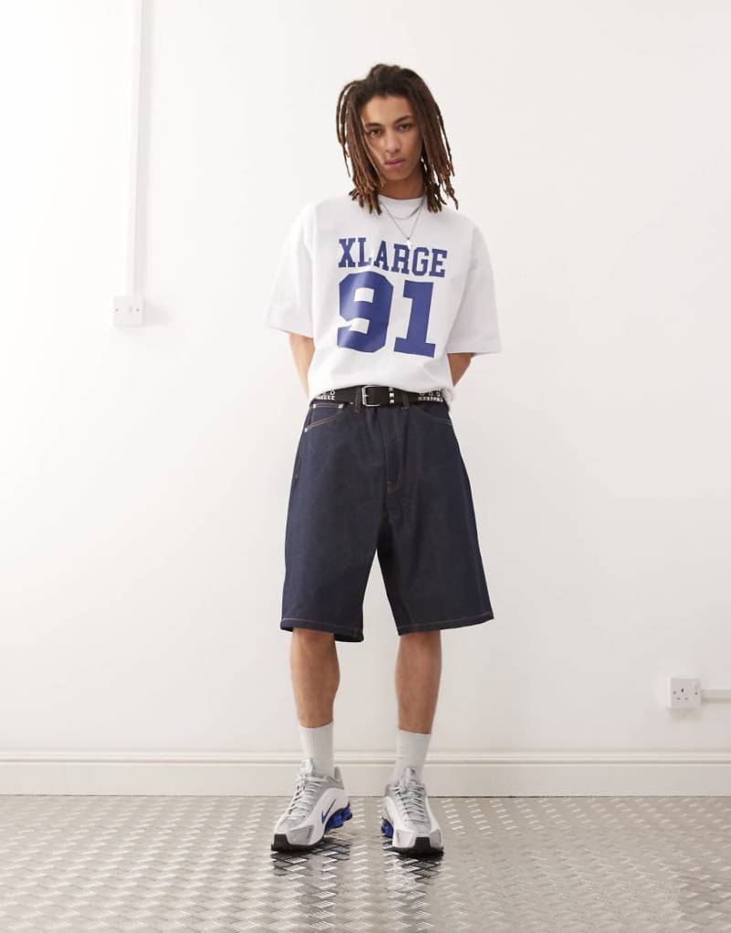 XLARGE - Weite Jorts in Rinse-Waschung mit OG-Logo-Stickerei auf der Gesäßtasche-Blau von Xlarge