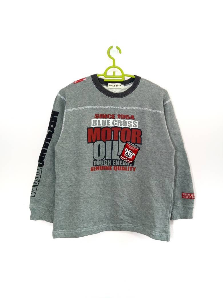 Vintage Blue Cross Motor Öl Sweatshirt Ringer Kleine Größe Vintage Blue Cross Motor Öl Sweatshirt Ringer Kleine Größe von XtraTopStore
