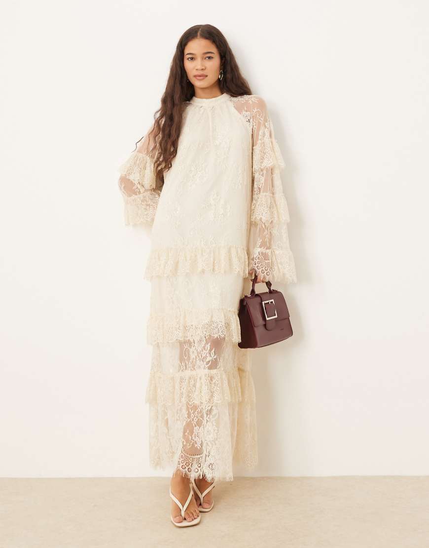 YAS - Gestuftes Maxikleid aus transparenter Spitze in Creme-Weiß YAS - Gestuftes Maxikleid aus transparenter Spitze in Creme-Weiß von YAS