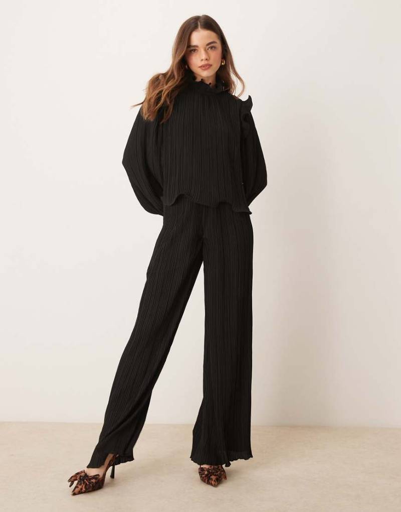 YAS - Plissierte Hose in Schwarz mit hohem Bund und weitem Bein, Kombiteil YAS - Plissierte Hose in Schwarz mit hohem Bund und weitem Bein, Kombiteil von YAS