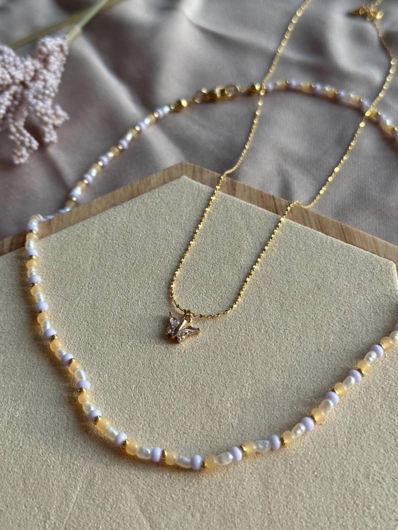 Perlenkette Aus Echten Süßwasserperlen | Halskette Gold, Lila, Orange Vergoldete Perlenhalskette Bunte Yourgoldenangel Perlenkette Aus Echten Süßwasserperlen | Halskette Gold, Lila, Orange Vergoldete Perlenhalskette Bunte Yourgoldenangel von YourGoldenAngel