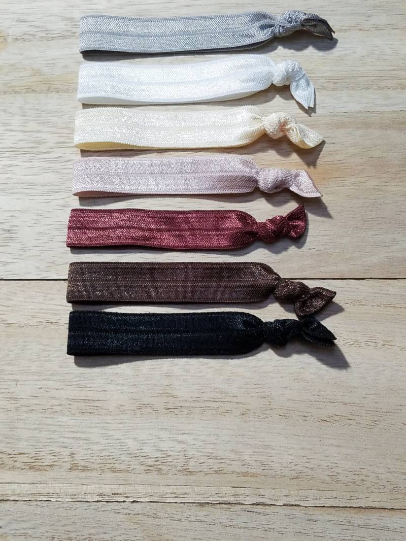 Neutrale Farbige Haargummis Neutrale Farbige Haargummis von YouveSaidItAll