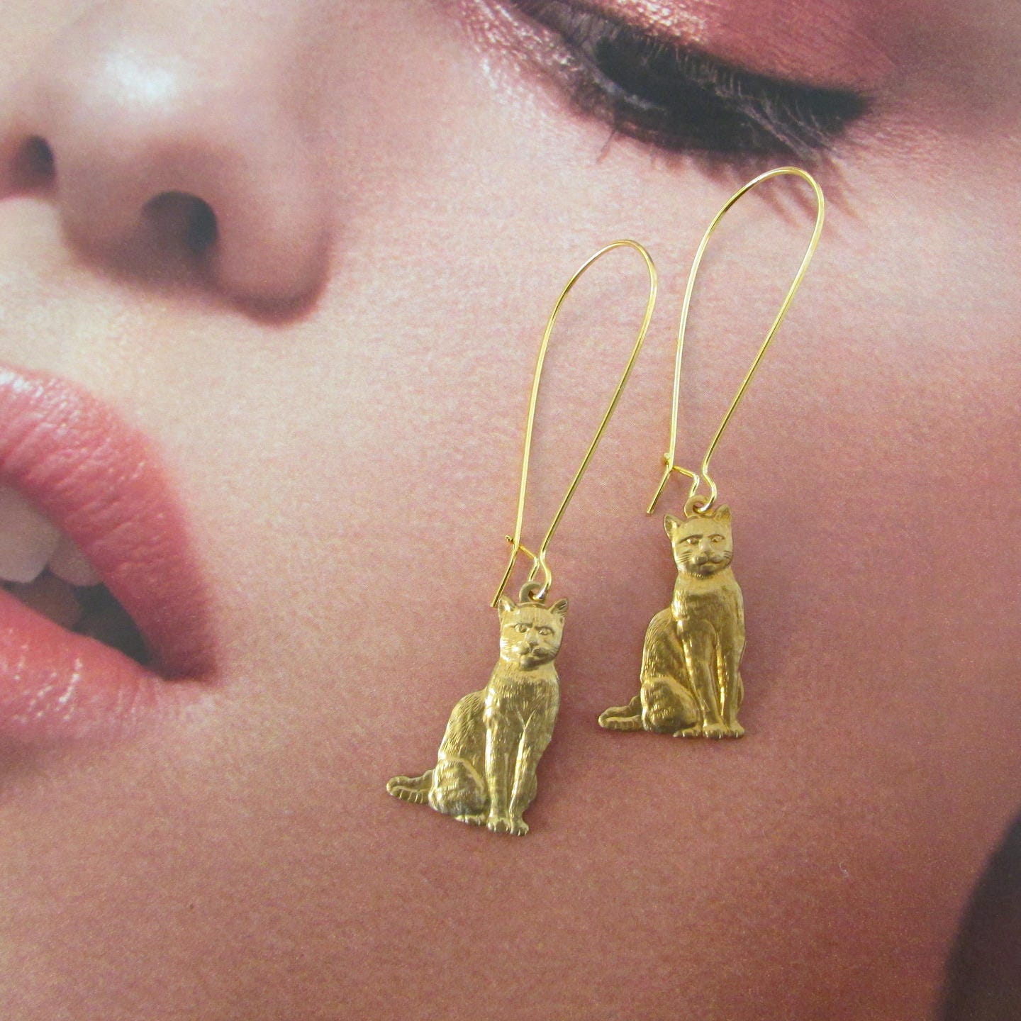 Goldener Katzenohrring Goldener Katzenohrring von YsArt