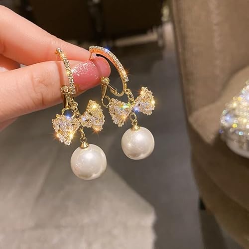 Schmetterling Ohrringe für Frauen Temperament Imitation Perle eingelegtes leuchtende Ohrringe Schmetterling Ohrringe für Frauen Temperament Imitation Perle eingelegtes leuchtende Ohrringe von ZCCZJS