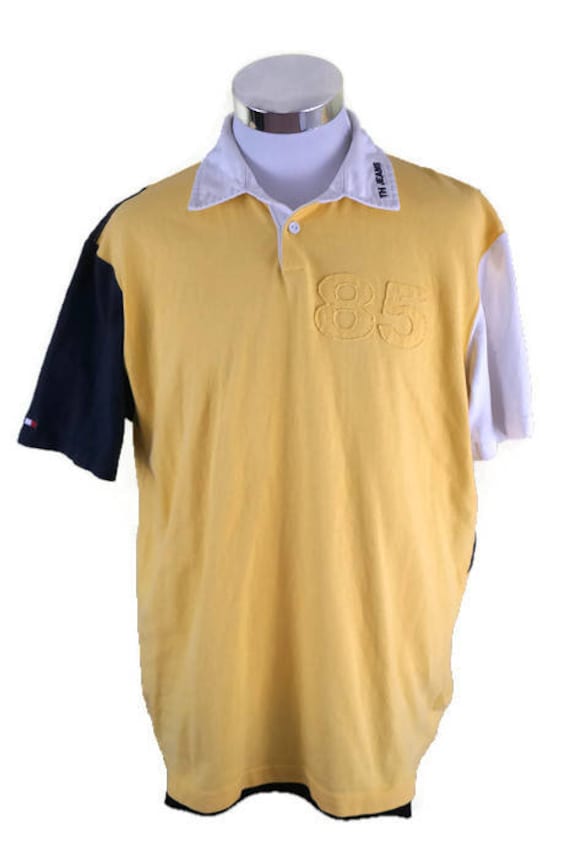 Vintage Tommy Hilfiger Jeans 85 Polo Shirt Größe Large Yellow Navy White Vintage Tommy Hilfiger Jeans 85 Polo Shirt Größe Large Yellow Navy White von ZIEHO