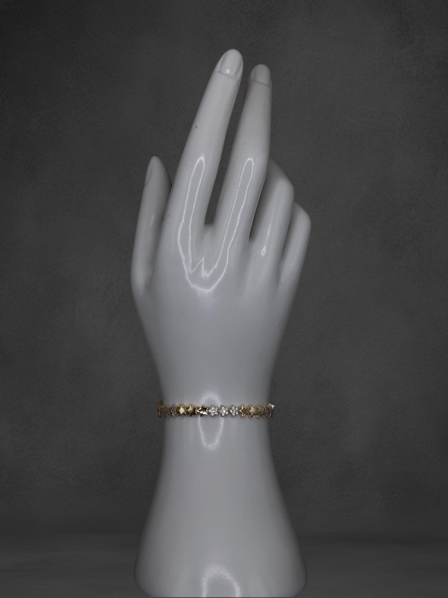 925 Sterling Silver & Gold-Tone Star Bracelet With Crystal Accents 925 Sterling Silver & Gold-Tone Star Bracelet With Crystal Accents von ZenvanaDE