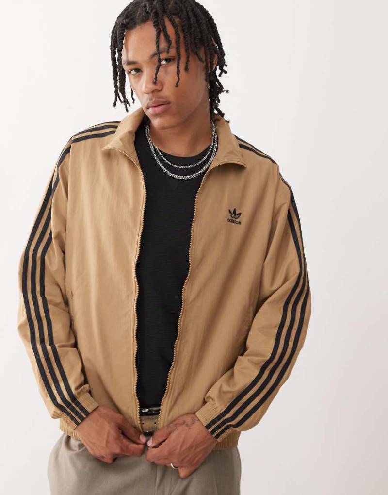 adidas Originals - Firebird - Trainingsjacke aus Webstoff in Braun und Schwarz von adidas Originals