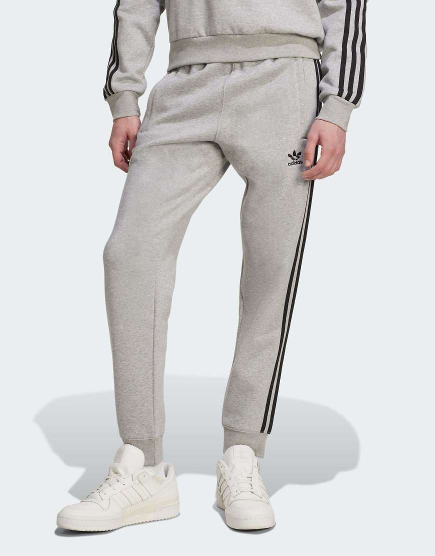 adidas Originals - Adicolor - Hose in meliertem Mittelgrau/Schwarz mit 3-Streifen von adidas Originals