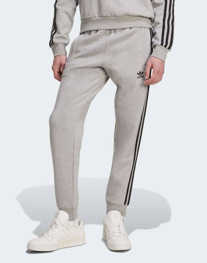adidas Originals - Adicolor - Hose in meliertem Mittelgrau/Schwarz mit 3-Streifen von adidas Originals