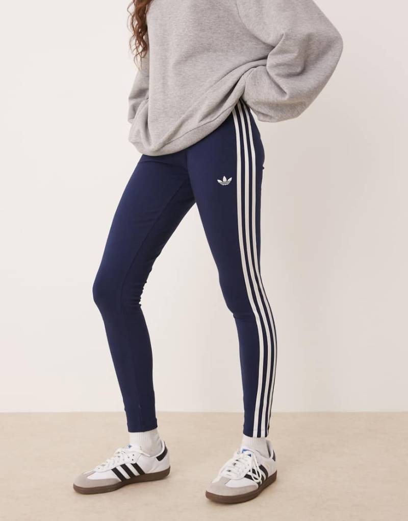 adidas Originals - Adicolor - Leggings in Marineblau und Weiß mit den 3 Streifen adidas Originals - Adicolor - Leggings in Marineblau und Weiß mit den 3 Streifen von adidas Originals