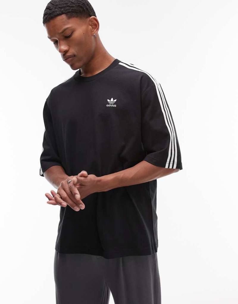 adidas Originals - Adicolor - Oversize-T-Shirt in Schwarz mit den 3 Streifen von adidas Originals