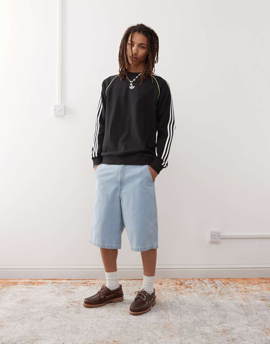 adidas Originals - Adicolor - Sweatshirt in Schwarz mit Paspelierung in Weiß von adidas Originals