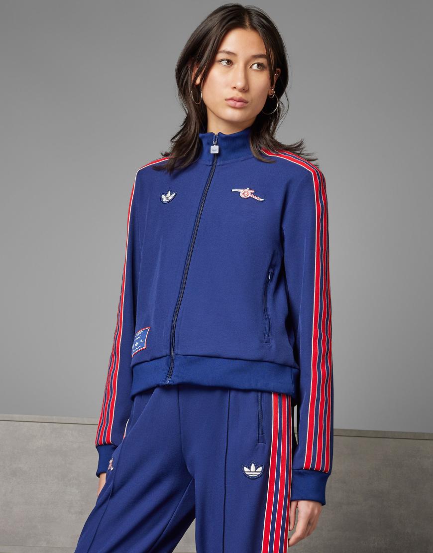 adidas Originals - Arsenal Football Terrace Icons - Trainingsoberteil in Nachthimmelblau adidas Originals - Arsenal Football Terrace Icons - Trainingsoberteil in Nachthimmelblau von adidas Originals