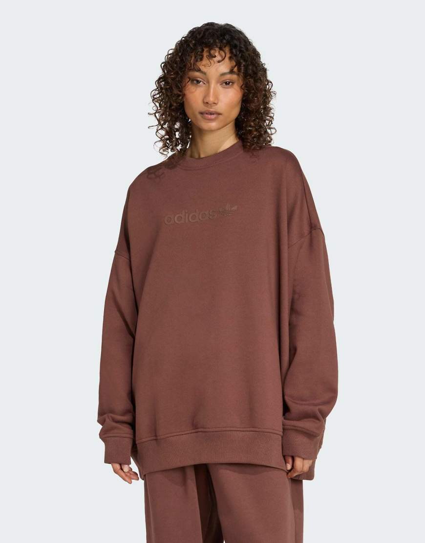 adidas Originals - Essentials - Oversize-Sweatshirt in Kastanienbraun mit linearem Logo und Rundhalsausschnitt-Brown adidas Originals - Essentials - Oversize-Sweatshirt in Kastanienbraun mit linearem Logo und Rundhalsausschnitt-Brown von adidas Originals