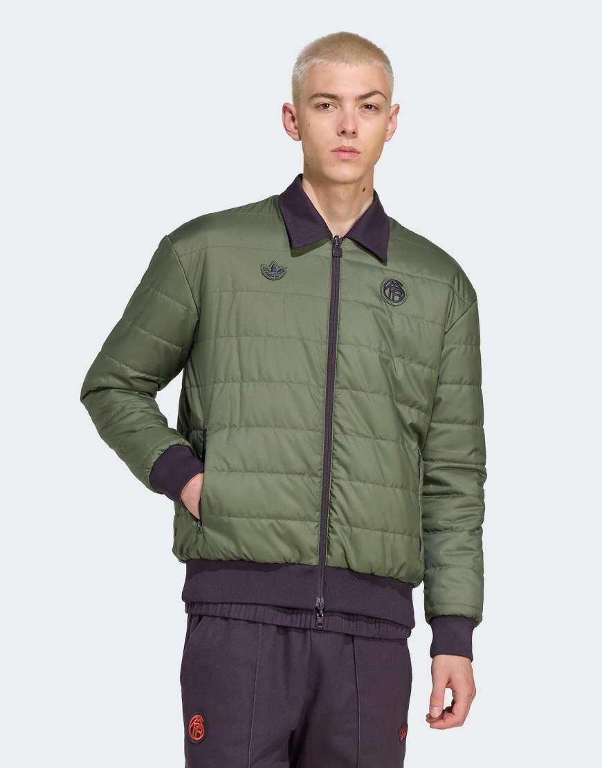 adidas Originals - FC Bayern Terrace Icons - Jacke in Aurora Black/Base Green-Schwarz von adidas Originals