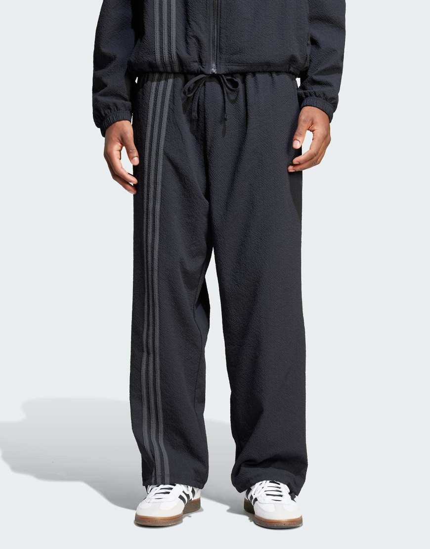 adidas Originals - Fashion Firebird - Trainingshose aus Seersucker in Schwarz von adidas Originals