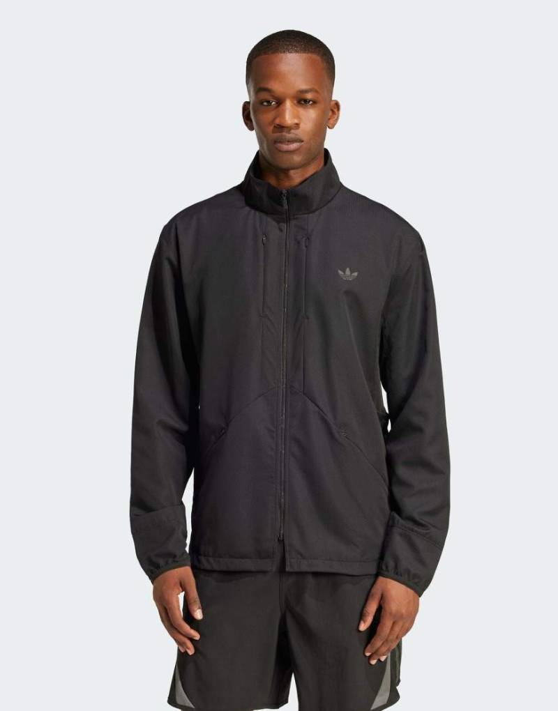 adidas Originals - Fashion - Retro-Jacke in Schwarz mit Cut-Out von adidas Originals