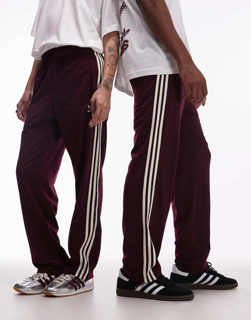 adidas Originals - Firebird - Locker sitzende Trainingshose in Burgunderrot von adidas Originals