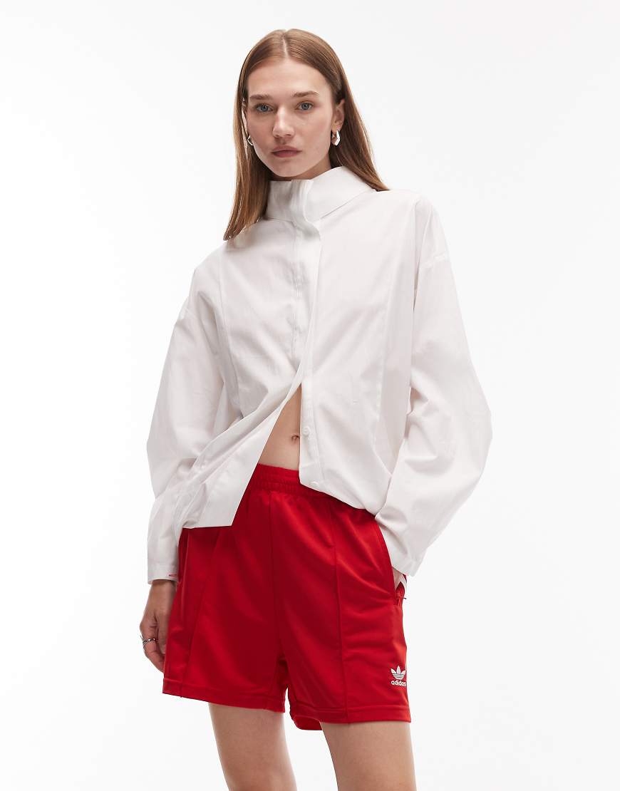 adidas Originals - Firebird - Shorts in Rot adidas Originals - Firebird - Shorts in Rot von adidas Originals