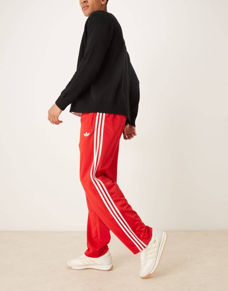 adidas Originals - Firebird - Trainingshose in Rot von adidas Originals