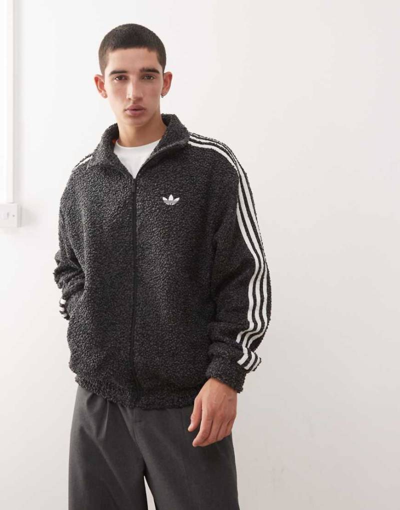 adidas Originals - Firebird - Trainingsjacke aus Bouclé in Schwarz von adidas Originals