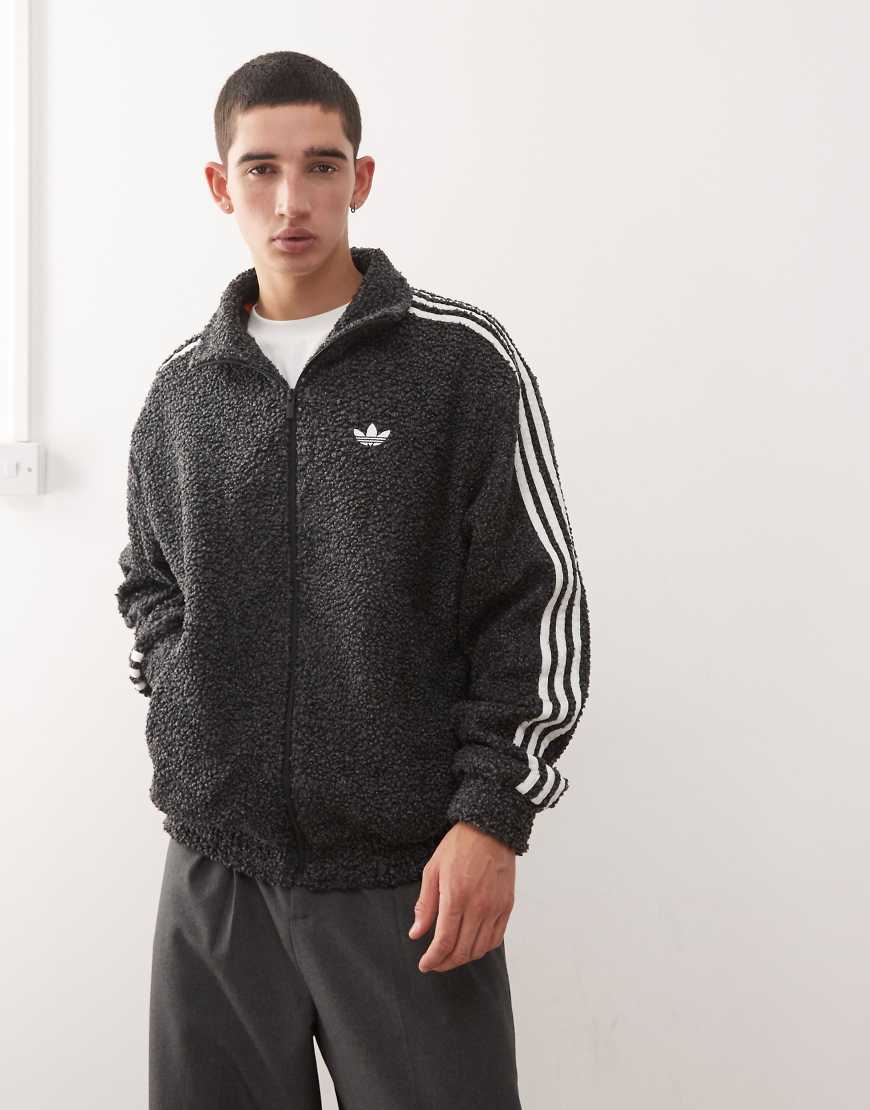 adidas Originals - Firebird - Trainingsjacke aus Bouclé in Schwarz von adidas Originals