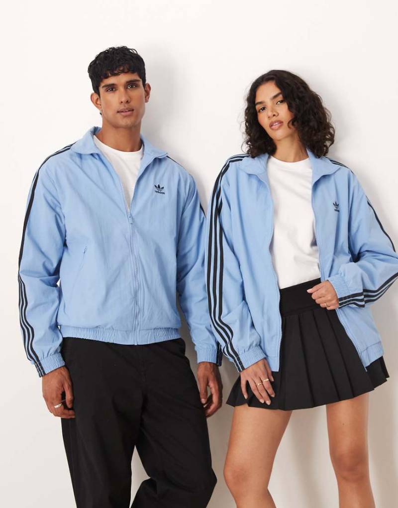 adidas Originals - Firebird - Trainingsjacke aus Webstoff in Blau von adidas Originals