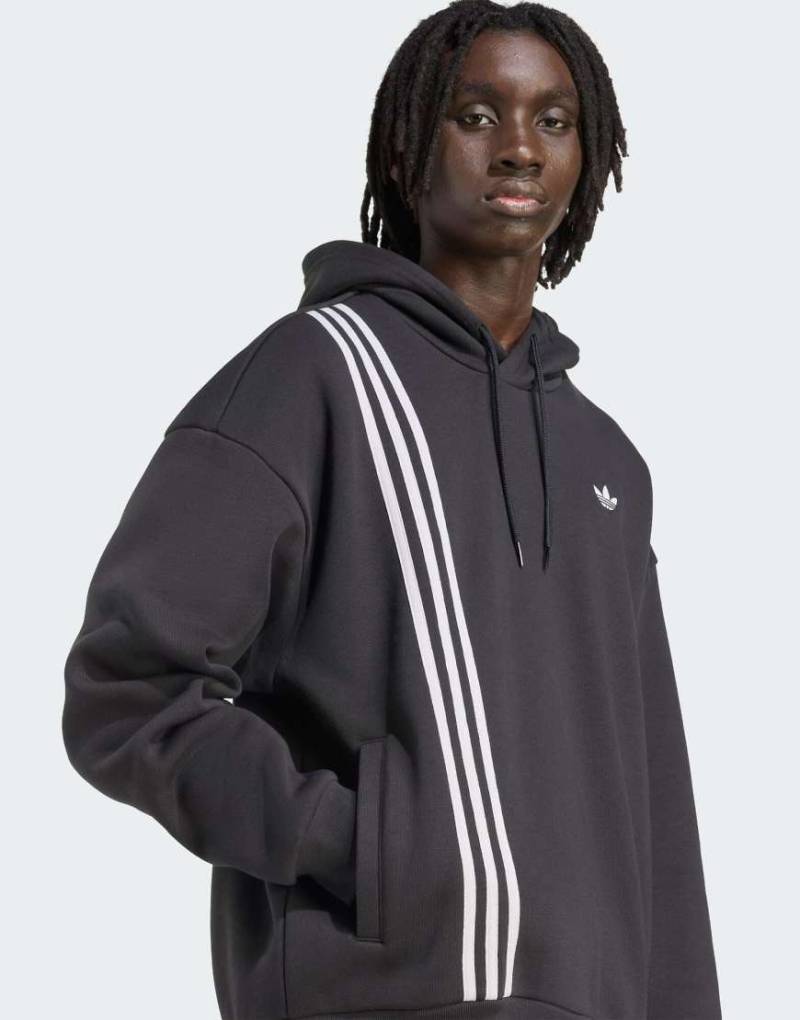 adidas Originals - Kapuzenpullover in Schwarz mit Streifen vorne von adidas Originals