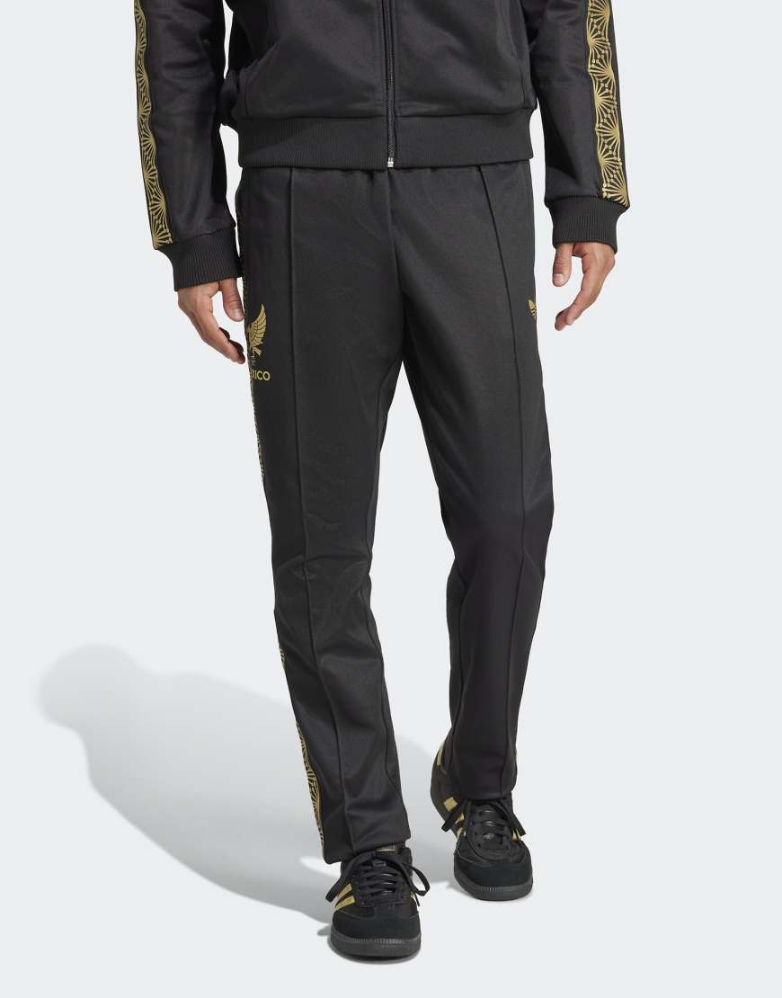 adidas Originals - Mexico - Trainingshose in Schwarz und Gold von adidas Originals