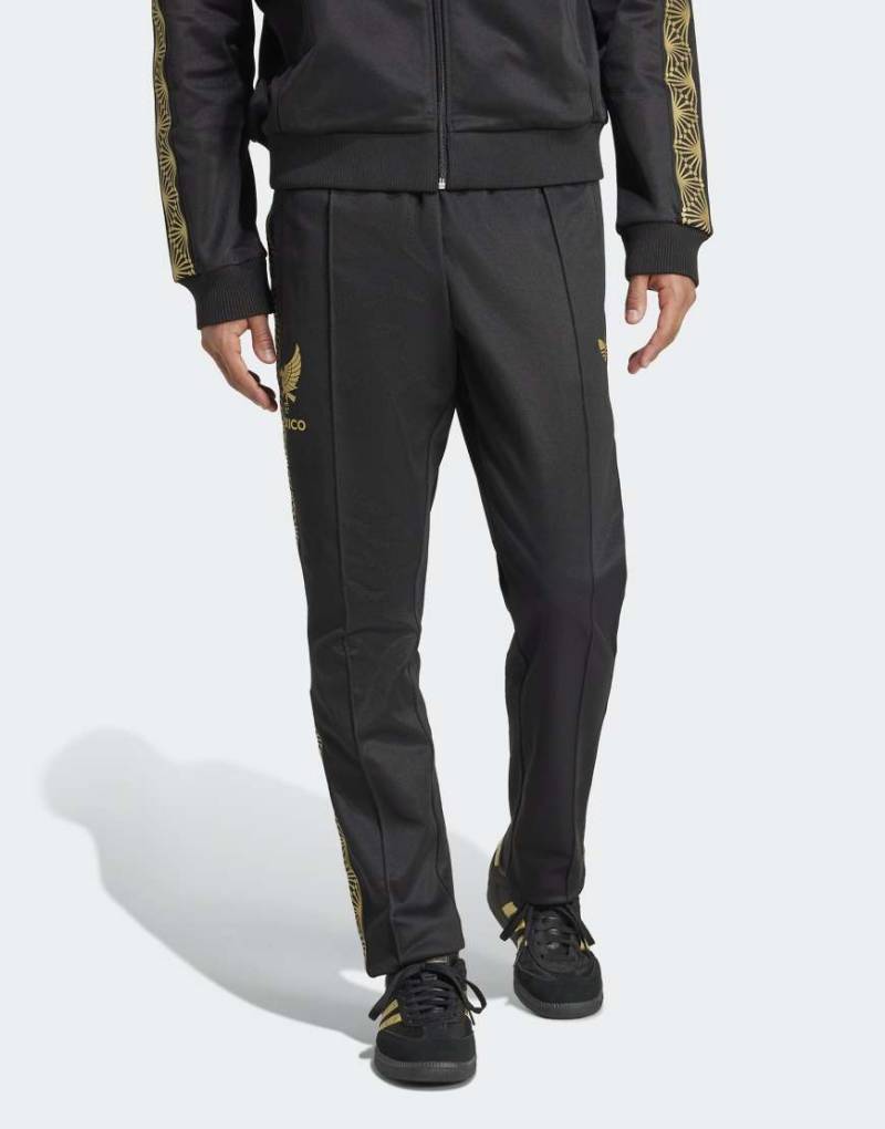 adidas Originals - Mexico - Trainingshose in Schwarz und Gold von adidas Originals