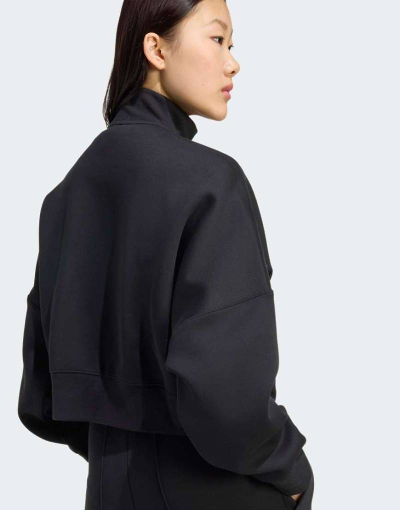 adidas Originals - Off Placed - Jacke in Schwarz mit Reißverschluss und den drei Streifen von adidas Originals