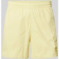 adidas Originals Relaxed Fit Shorts mit Label-Stitching Modell 'SPRINTER' in Hellgelb, Größe XS von adidas Originals