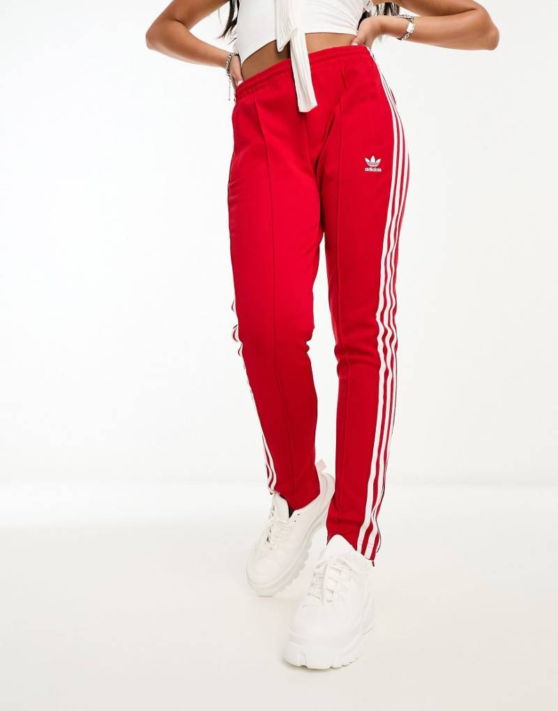 adidas Originals - SST - Trainingshose in Rot von adidas Originals