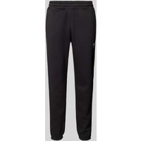 adidas Originals Tapered Fit Sweatpants mit Label-Stitching in Black, Größe XL von adidas Originals