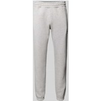 adidas Originals Tapered Fit Sweatpants mit Label-Stitching in Hellgrau Melange, Größe XL von adidas Originals