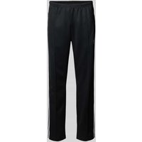 adidas Originals Trainingshose mit Längsnähten und elastischem Bund in Black, Größe S von adidas Originals