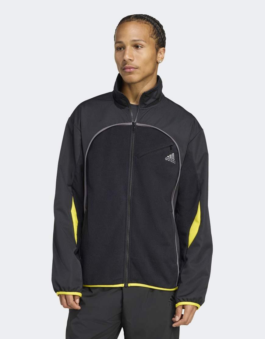 adidas Originals - Trainingsoberteil aus Polarfleece in Schwarz adidas Originals - Trainingsoberteil aus Polarfleece in Schwarz von adidas Originals