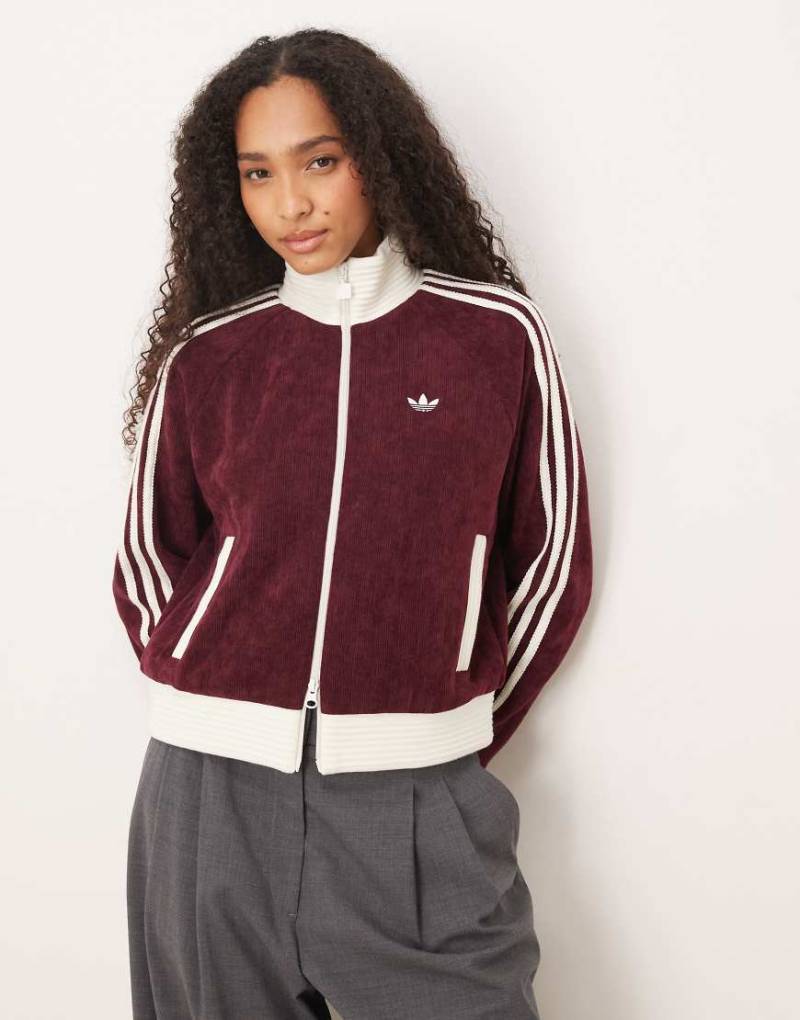 adidas Originals - Trainingsoberteil aus Velours in Burgunderrot adidas Originals - Trainingsoberteil aus Velours in Burgunderrot von adidas Originals