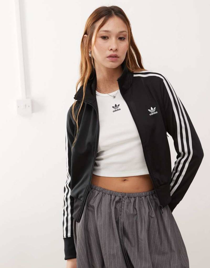adidas Originals - Trainingsoberteil in Schwarz/Weiß mit den 3 Streifen adidas Originals - Trainingsoberteil in Schwarz/Weiß mit den 3 Streifen von adidas Originals