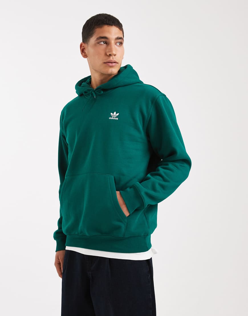 adidas Originals - Trefoil Essentials - Lockerer Kapuzenpullover in College-Grün mit Dreiblatt-Logo von adidas Originals